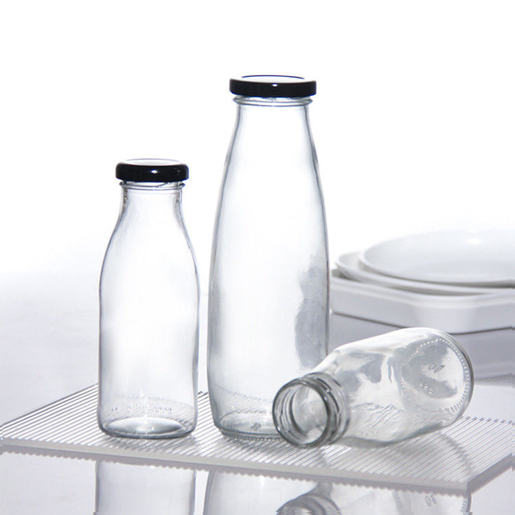 OEM 250ml 500ml 1000ml 2 λίτρα γυάλινα μπουκάλια γάλακτος γλάστρα Τροφική ποιότητα Στρογγυλό σχήμα