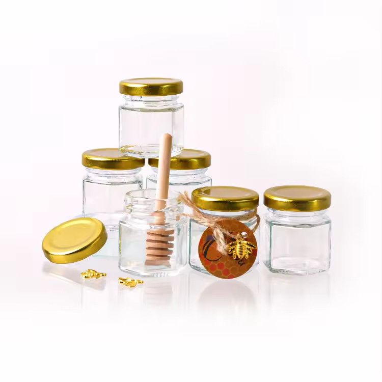 Προσαρμοσμένη ετικέτα Έξαγωνο σχήμα 100ml 180ml 380ml Γυάλινο βάζο με μέλι για μαρμελάδα ελαιοειδών