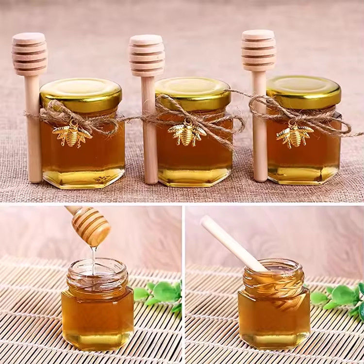Προσαρμοσμένη ετικέτα Έξαγωνο σχήμα 100ml 180ml 380ml Γυάλινο βάζο με μέλι για μαρμελάδα ελαιοειδών