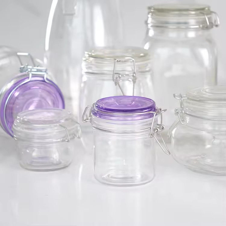 Πιο δημοφιλές χονδρικό 100ml 180ml 280ml Γυροειδή γυάλινο βάζο μέλις τροφικής ποιότητας με κάλυμμα κλιπ