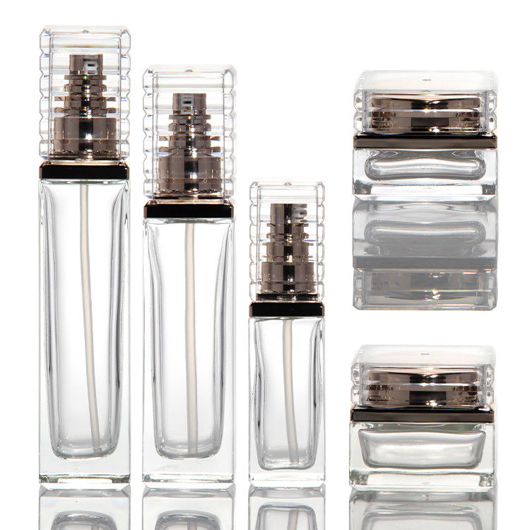30ml 50ml 80ml 100ml Διαφανές γυάλινο μπουκάλι αντλίας για ορό αιθέρια έλαια αρωματική λοσιόν