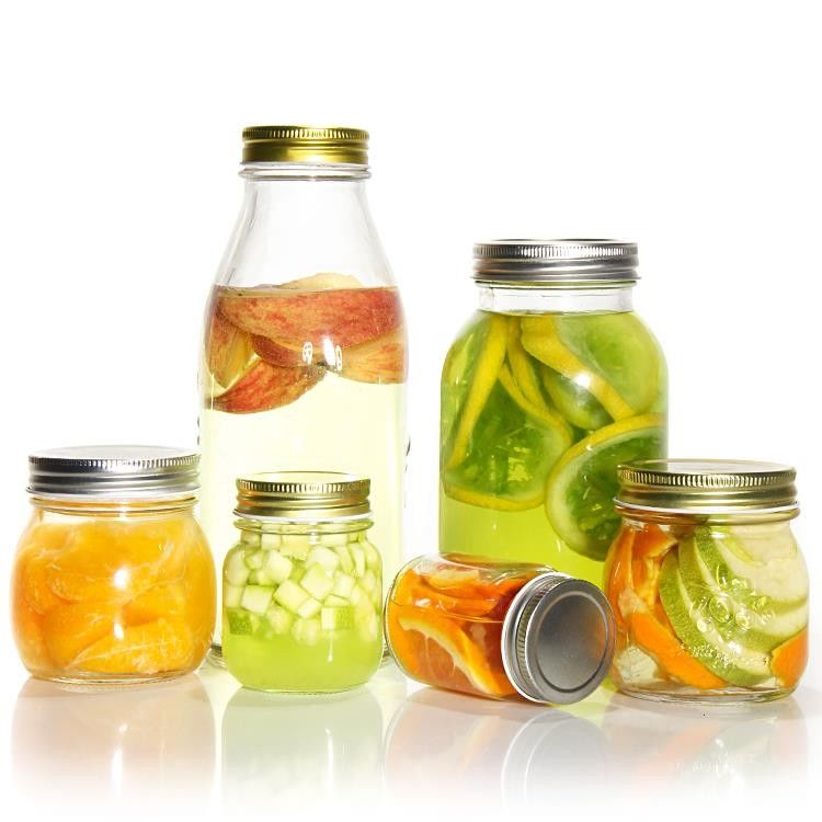 Προσαρμοσμένο σχεδιασμό 8 Oz 16 Oz Συσκευή αποθήκευσης τροφίμων Glass Mason Jar με κάλυμμα