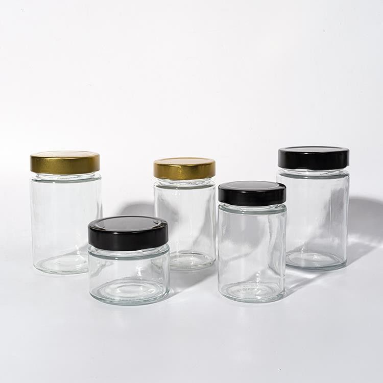 Χρήση σε εργοστάσια τροφίμων 1oz 4oz 8oz Στρογγυλό σχήμα Διαυγές κενό δοχείο αποθήκευσης γυαλί ζελετί μαρμελάδα μέλι σάλτσα βάζο