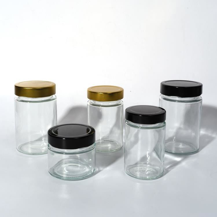 Χρήση σε εργοστάσια τροφίμων 1oz 4oz 8oz Στρογγυλό σχήμα Διαυγές κενό δοχείο αποθήκευσης γυαλί ζελετί μαρμελάδα μέλι σάλτσα βάζο